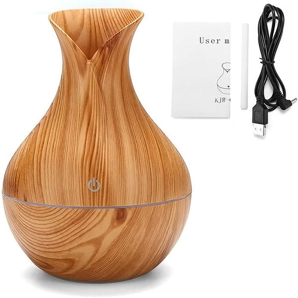 AromaMist – Compact LED Humidifier with Essential Oils