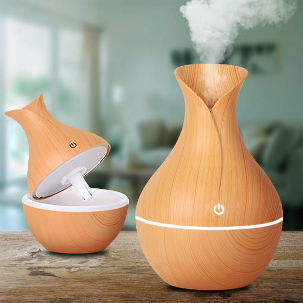 AromaMist – Compact LED Humidifier with Essential Oils