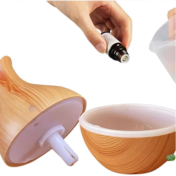 AromaMist – Compact LED Humidifier with Essential Oils